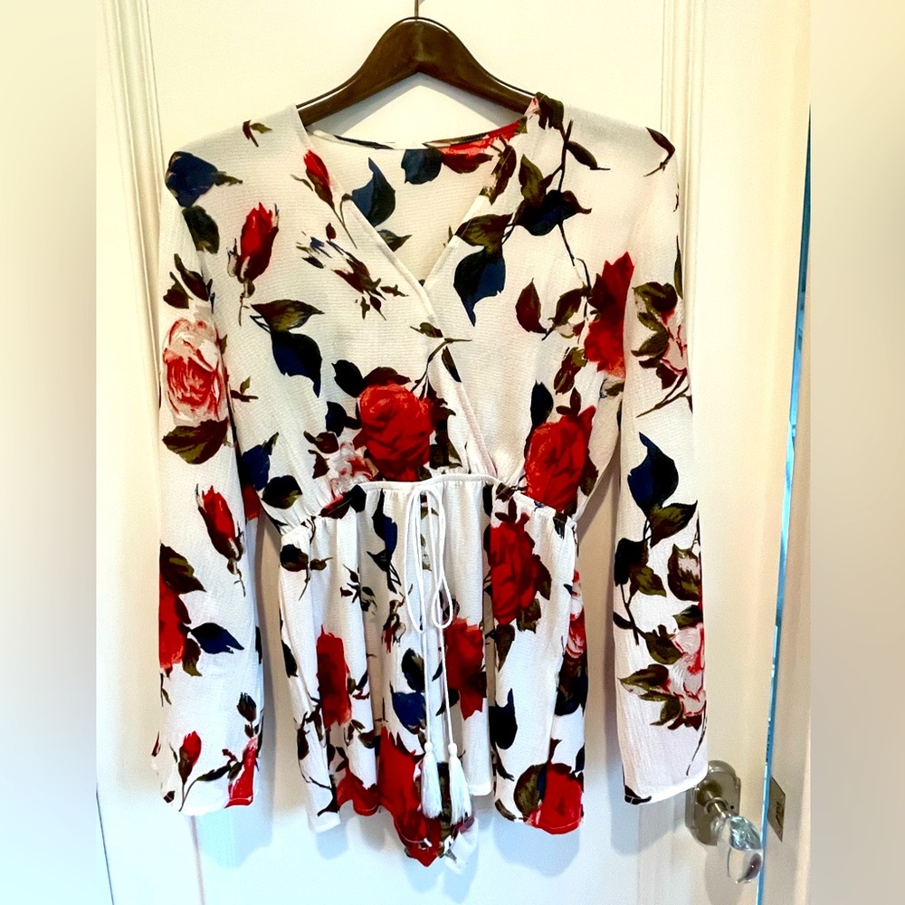 Floral Romper. Size Medium. Great condition.